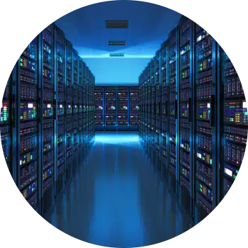 The hand of a person holding a scanner and pointing it at the barcode on the end of an archive box on a shelf